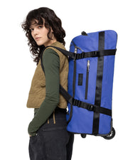 EASTPAK Duffel - حقيبة Duffel بعجلات متوسطة، لون أزرق "تارب"